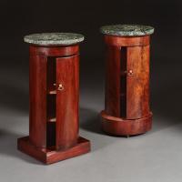 A Matched Pair of Empire Mahogany Pedestal Cupboards