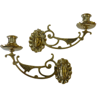 Pair of winged candle sconces
