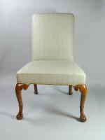 Pair of George II walnut cabriole leg chairs with claw and ball feet, c.1730