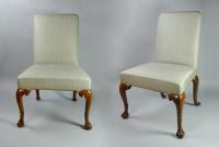 Pair of George II walnut cabriole leg chairs with claw and ball feet, c.1730