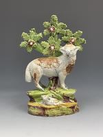 Staffordshire boacage pearlware glazed pottery figure of a ewe and lamb circa 1820