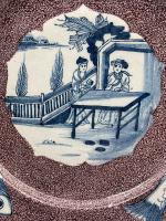 English delftware pottery plate manganese ground the border with three fishes. Mid 18th century