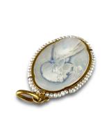Gold and diamond pendant with a pearl cameo of the Virgin. French, circa 1900