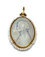 Gold and diamond pendant with a pearl cameo of the Virgin. French, circa 1900