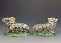 Pair of pottery figures a Ram and Ewe underglaze oxide decoration late 18th century