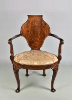 Queen Anne walnut escutcheon back writing chair, c.1710