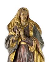 Limewood relief of the Madonna on a crescent moon. German, 17th - 18th century