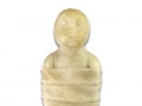 Miniature alabaster sculpture of a swaddled baby. German, 17th century