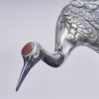 Japanese pair of silvered bronze cranes signed in an oval reserve Hidenao Meiji period