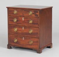 Delightful late 18th century miniature mahogany chest of drawers