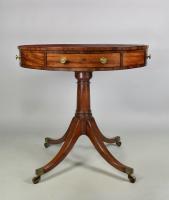 A small George III mahogany revolving drum table, c.1800
