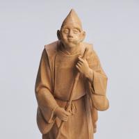 Japanese wood figure of a Shinto priest signed Choshun saku, Showa Period.