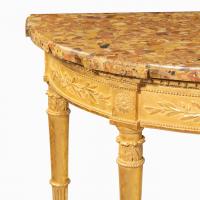A Louis Philippe giltwood demi-lune console table