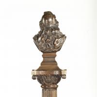 A bronze column depicting ‘La Colonne de la Republique’ dated 1889, after Paul LeCreux