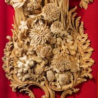 An exceptional carved lime and soft wood plaque by the carver James Peake, signed and dated 1895