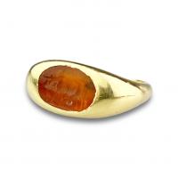 Roman carnelian ring with intaglio of a Cow and calf. 1st-2nd century AD