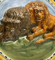 Prattware relief molded plaque with two male lions in repose English pottery circa 1800