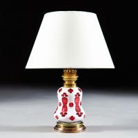 A Gothic Red and White Glass Lamp with Brass Base
