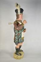 Early nineteenth century carved wood tobacconist figure of a Highlander with largely original paint, c.1820