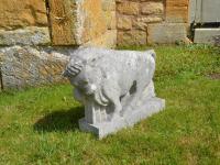 A Portland stone sculpture of a bull (Taurus) by Roy Smith RWA