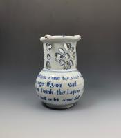 Liverpool delftware puzzle jug with a sporting tavern rhyme circa 1745 English