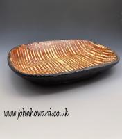 English slipware earthenware baking dish with striking comb decoration late 18th century