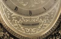 A Large Oval Strut Clock By Thomas Cole