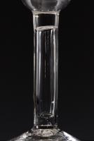 A wineglass, hollow stem