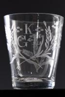 A tumbler engraved flowers