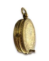 Engraved gilt metal portable pyx. French, early 17th century