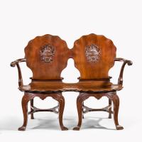 An exceptional late George II mahogany settee, attributed to William Hallett