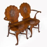 An exceptional late George II mahogany settee, attributed to William Hallett