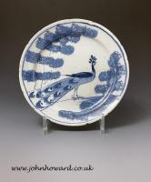 Bristol delftware blue and white plate with peacock and trees from the farmyard series mid 18th century