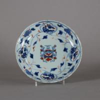 front of armorial plate