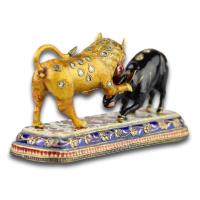 Enamelled gold sculpture of a lion attacking an ox. Indian, 19th-20th century