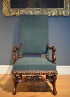 A William III walnut armchair Circa 1700