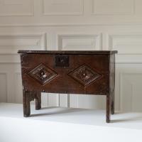 A Henry VIII boarded oak chest, of particularly small size, circa 1530