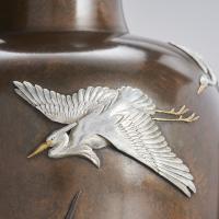 Japanese bronze vase with cranes in flight