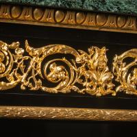 A detail of A Pair of French Gilt-Bronze Mounted Ebonised Meubles d'Appui 