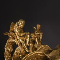 A detail of A Pair of Gilt and Patinated Bronze Ewers by Maison Giroux
