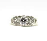 Antique three-stone diamond ring