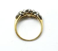 Antique three-stone diamond ring