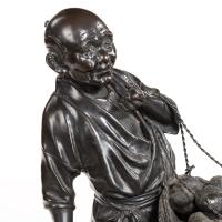Meiji period bronze of a vegetable seller