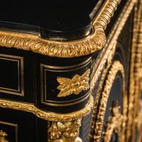A Detail from A Napoleon III Gilt-Bronze and Hardstone Inset Ebonised Pier Cabinet