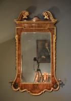 George II parcel gilt walnut mirror