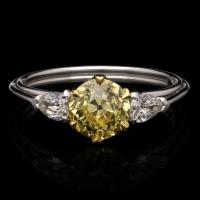 Hancocks 1.27ct Fancy Intense Yellow Old European Brilliant Cut Diamond Ring With Pear Shape Shoulders