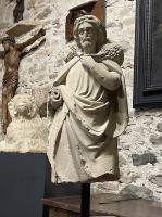 A TRULY STUNNING AND MUSEUM QUALITY ROMANESQUE SCULPTURE OF CHRIST AS THE GOOD SHEPHERD. FRENCH.CIRCA 1250.