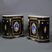 A Pair Of Napoleon III Gilt-Bronze And Porcelain-Mounted Ebony and Ebonised Cabinets. French, Circa 1860