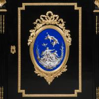Napoleon III Gilt-Bronze And Porcelain-Mounted Ebonised Cabinets