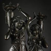 Victor Paillard (French, 1805-1886) A Pair Of Napoleon III Patrinated-Bronze Figures, Modelled As Classically Robed Maidens Bearing Urns 